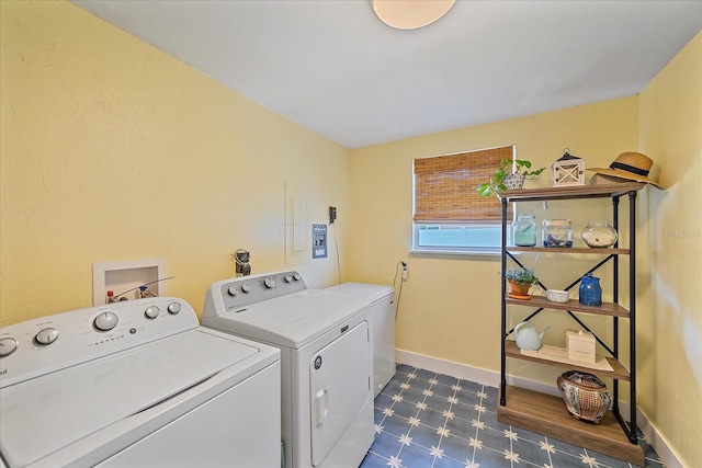 130 E Seminole Dr, Venice, FL 34293 - washroom with laundry area, dark floors, washing machine and clothes dryer, and baseboards