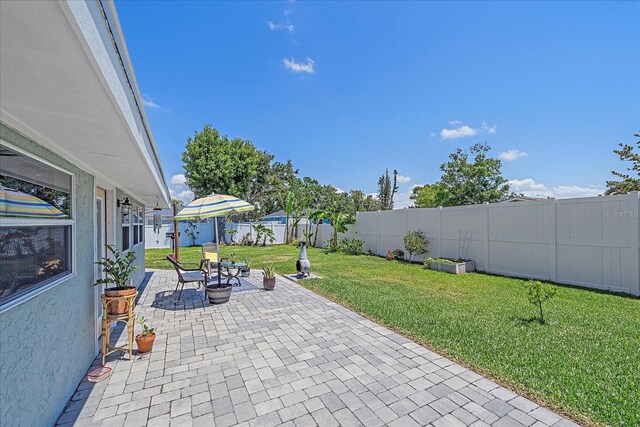 130 E Seminole Dr, Venice, FL 34293 - view of patio with a fenced backyard