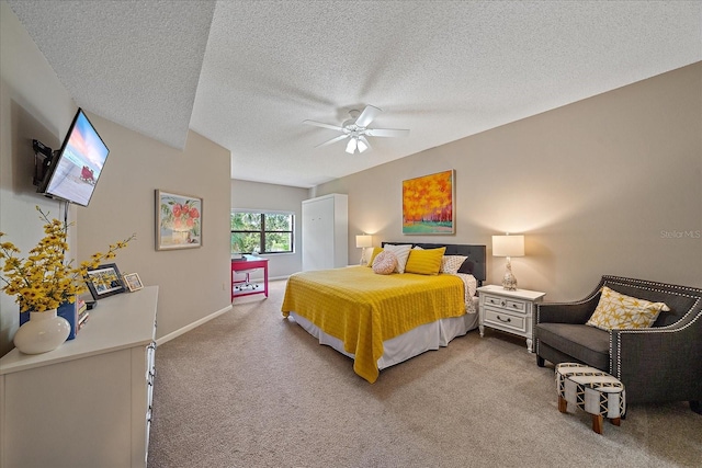 1612 Starling Dr Unit 101, Sarasota, FL 34231 - carpeted bedroom with a textured ceiling, baseboards, and a ceiling fan