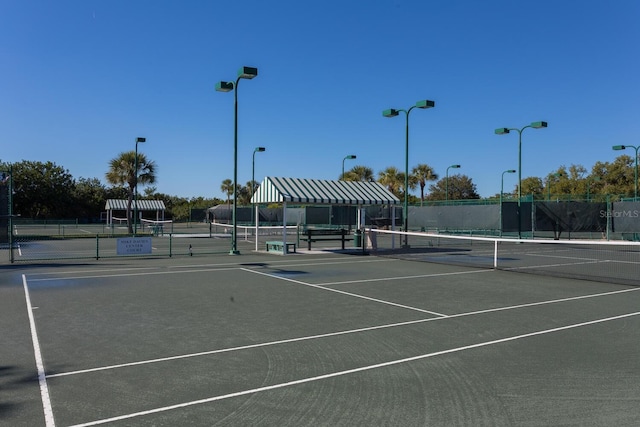 1612 Starling Dr Unit 101, Sarasota, FL 34231 - view of sport court featuring fence
