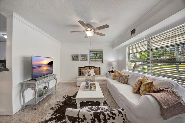 2307 Valencia Dr, Sarasota, FL 34239 - living room featuring visible vents, ornamental molding, baseboards, and ceiling fan