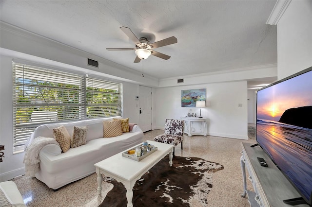 2307 Valencia Dr, Sarasota, FL 34239 - living area with visible vents, baseboards, speckled floor, a ceiling fan, and crown molding