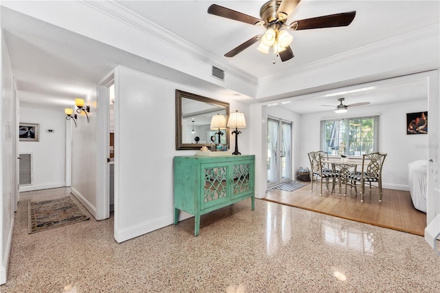 2307 Valencia Dr, Sarasota, FL 34239 - interior space with speckled floor, baseboards, crown molding, and visible vents