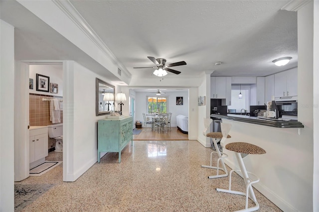 2307 Valencia Dr, Sarasota, FL 34239 - interior space featuring speckled floor, visible vents, and baseboards