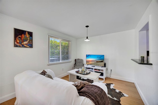 2307 Valencia Dr, Sarasota, FL 34239 - interior space featuring light wood-type flooring and baseboards
