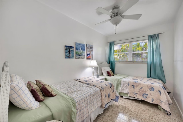 2307 Valencia Dr, Sarasota, FL 34239 - carpeted bedroom with baseboards and ceiling fan
