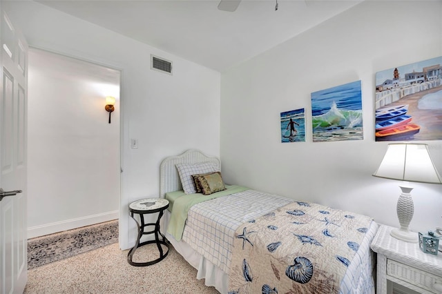 2307 Valencia Dr, Sarasota, FL 34239 - bedroom with speckled floor, visible vents, baseboards, and ceiling fan