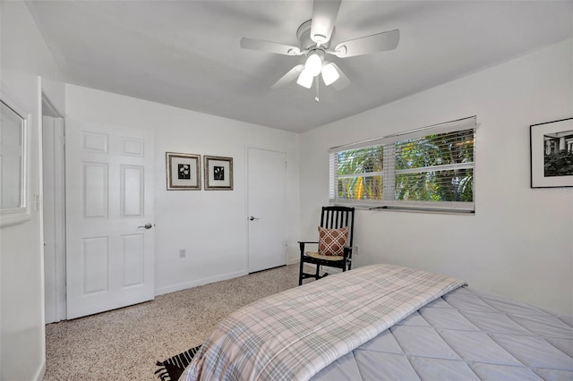 2307 Valencia Dr, Sarasota, FL 34239 - bedroom featuring a ceiling fan and baseboards