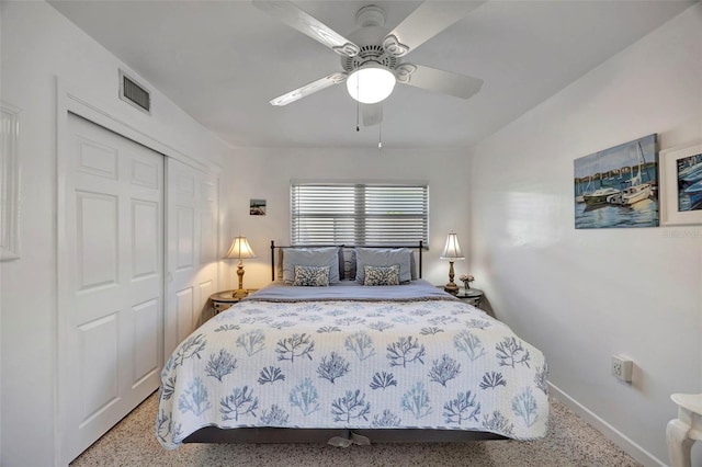 2307 Valencia Dr, Sarasota, FL 34239 - bedroom featuring a closet, speckled floor, ceiling fan, baseboards, and visible vents