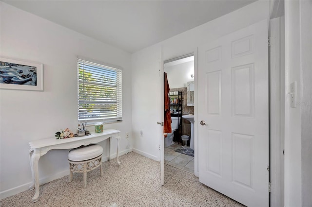 2307 Valencia Dr, Sarasota, FL 34239 - home office with light speckled floor and baseboards