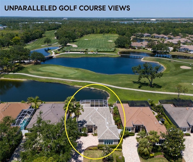 8715 52nd Ave E, Bradenton, FL 34211 - aerial perspective of suburban area featuring a large body of water and a local golf course