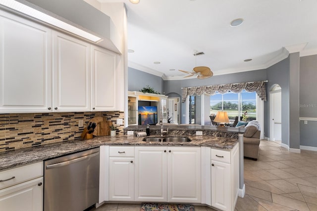 8715 52nd Ave E, Bradenton, FL 34211 - kitchen with stainless steel dishwasher, ornamental molding, a ceiling fan, tasteful backsplash, and open floor plan