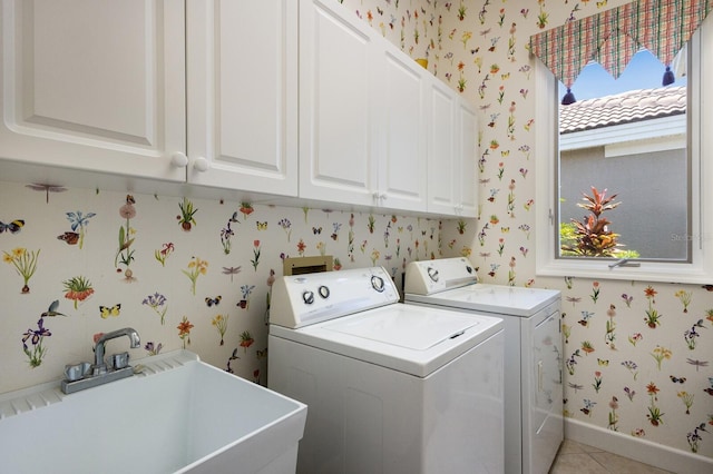 8715 52nd Ave E, Bradenton, FL 34211 - washroom featuring wallpapered walls, cabinet space, independent washer and dryer, and light tile patterned flooring