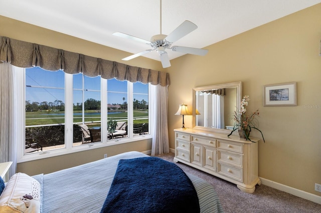 8715 52nd Ave E, Bradenton, FL 34211 - carpeted bedroom with a water view and a ceiling fan