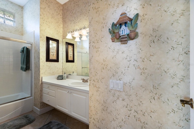 8715 52nd Ave E, Bradenton, FL 34211 - bathroom with tile patterned flooring, vanity, and bath / shower combo with glass door