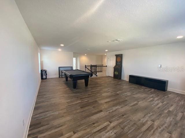 1142 Blarney St, Minneola, FL 34715 - recreation room with a textured ceiling, wood finished floors, baseboards, and billiards
