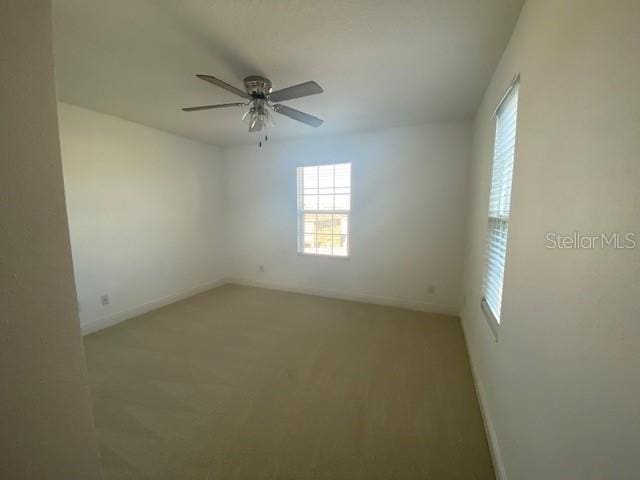 1142 Blarney St, Minneola, FL 34715 - carpeted spare room with baseboards and a ceiling fan