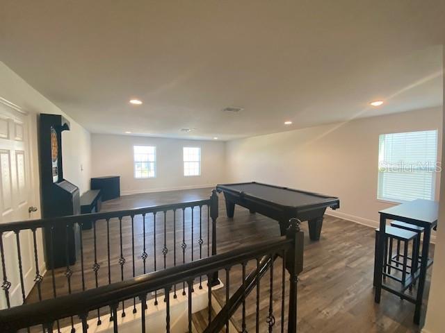 1142 Blarney St, Minneola, FL 34715 - playroom featuring baseboards, recessed lighting, billiards, and dark wood-style floors