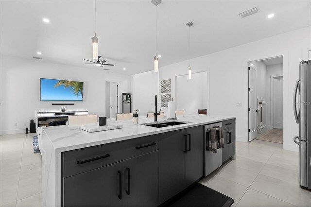 3724 SW 3rd St, Cape Coral, FL 33991 - kitchen featuring light tile patterned floors, a sink, visible vents, and stainless steel appliances