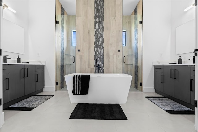 3724 SW 3rd St, Cape Coral, FL 33991 - full bath featuring two vanities, a shower stall, and a soaking tub
