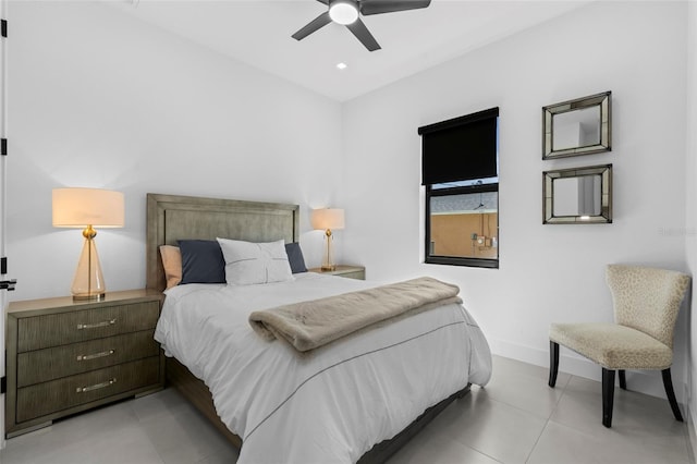 3724 SW 3rd St, Cape Coral, FL 33991 - tiled bedroom with baseboards and ceiling fan