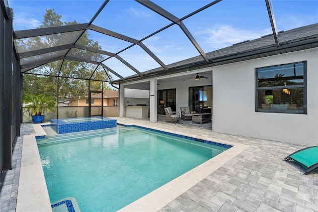 3724 SW 3rd St, Cape Coral, FL 33991 - view of pool with a patio area, outdoor lounge area, a pool with connected hot tub, a ceiling fan, and area for grilling
