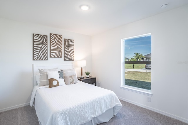 1073 Bristol St, Port Charlotte, FL 33952 - bedroom with carpet flooring and baseboards