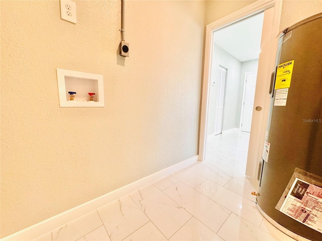 1142 Newhope Rd, Spring Hill, FL 34606 - laundry area with baseboards, marble finish floor, laundry area, and washer hookup