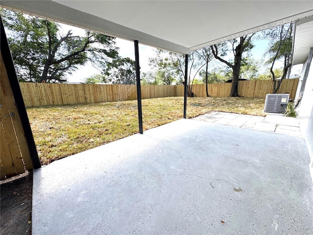 1142 Newhope Rd, Spring Hill, FL 34606 - view of patio with ac unit and a fenced backyard