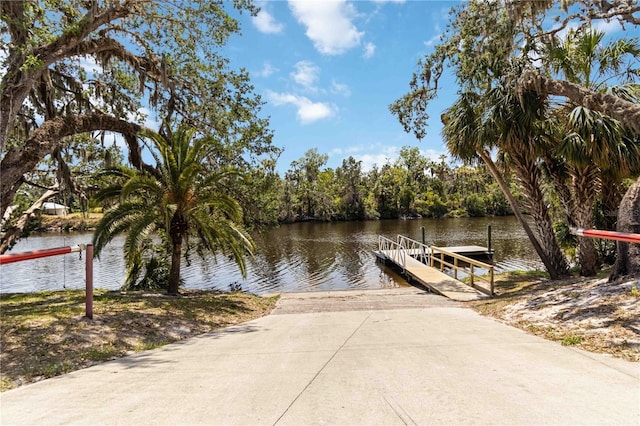 view of dock with a water view