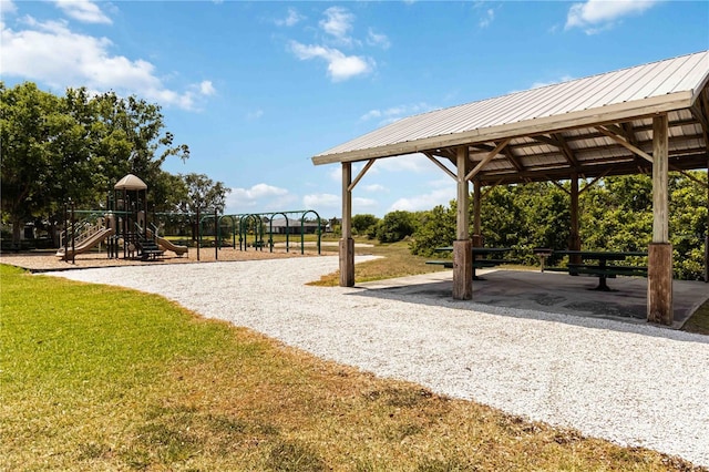 surrounding community featuring a lawn, playground community, and a gazebo
