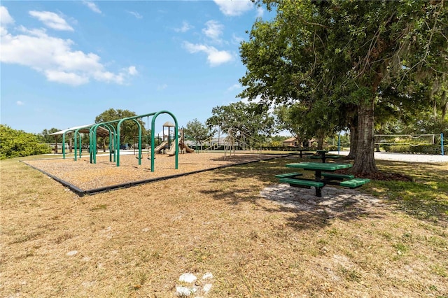 community play area with a lawn