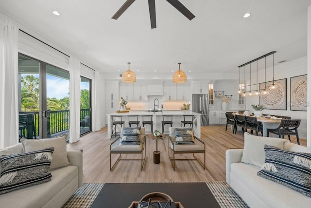 89 Avenida Messina, Sarasota, FL 34242 - living area featuring ceiling fan, light wood-style floors, and recessed lighting