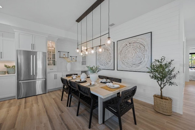 89 Avenida Messina, Sarasota, FL 34242 - dining area featuring light wood-type flooring