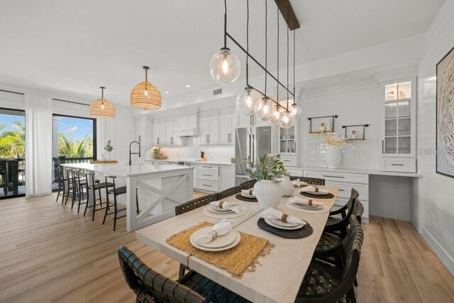 89 Avenida Messina, Sarasota, FL 34242 - dining space with light wood finished floors, visible vents, and recessed lighting