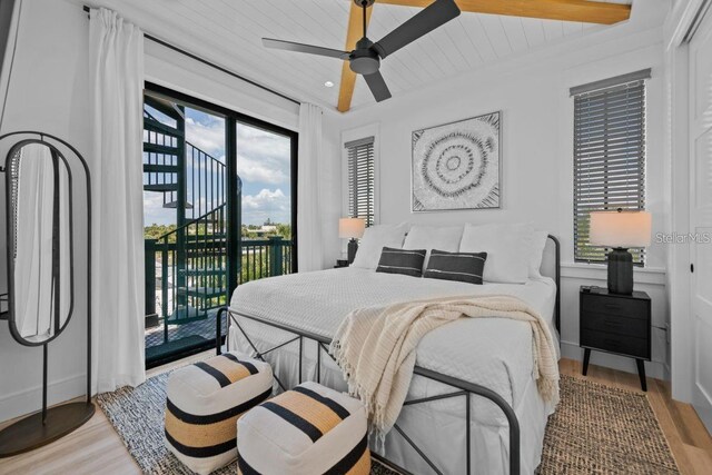 89 Avenida Messina, Sarasota, FL 34242 - bedroom with a ceiling fan, access to outside, and wood finished floors