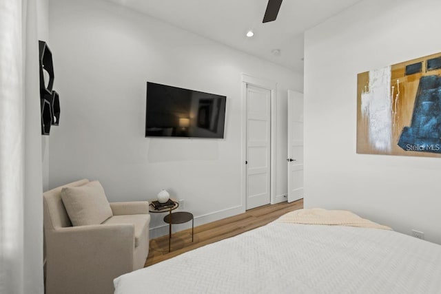 89 Avenida Messina, Sarasota, FL 34242 - bedroom featuring baseboards, a ceiling fan, wood finished floors, and recessed lighting