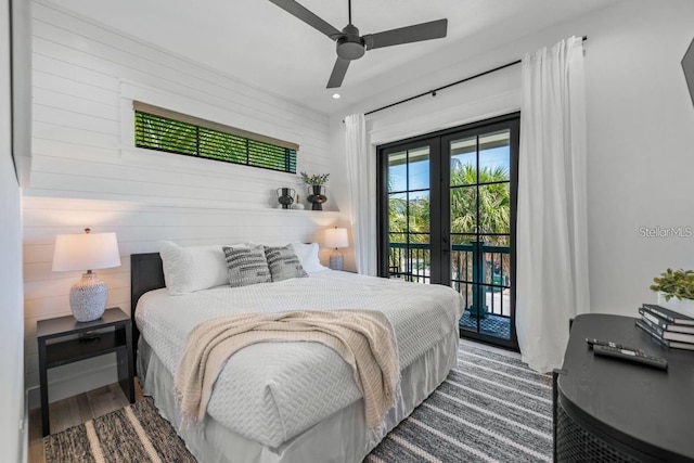 89 Avenida Messina, Sarasota, FL 34242 - bedroom with wood finished floors, wood walls, french doors, and access to exterior