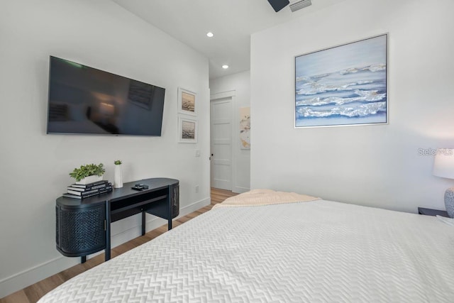 89 Avenida Messina, Sarasota, FL 34242 - bedroom featuring recessed lighting, wood finished floors, and baseboards