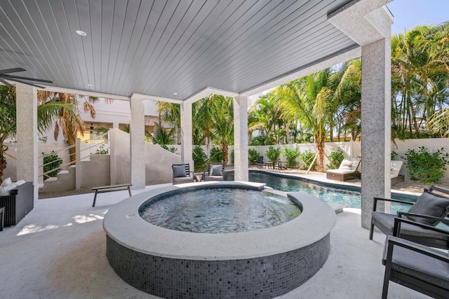 89 Avenida Messina, Sarasota, FL 34242 - view of pool with a patio area, a fenced backyard, a fenced in pool, and an in ground hot tub