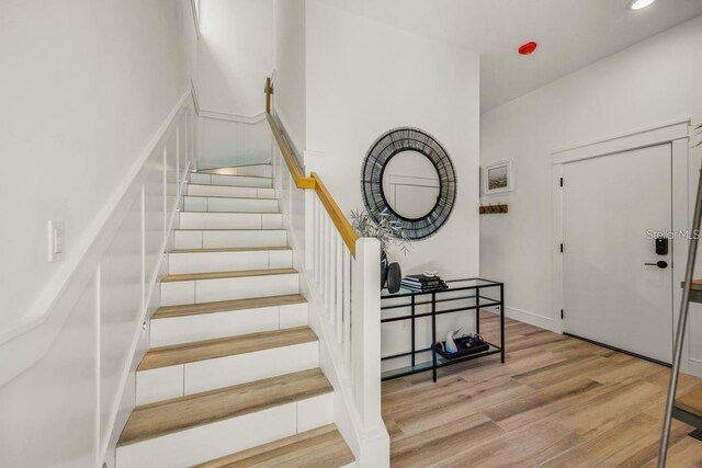 89 Avenida Messina, Sarasota, FL 34242 - stairs featuring wood finished floors and recessed lighting