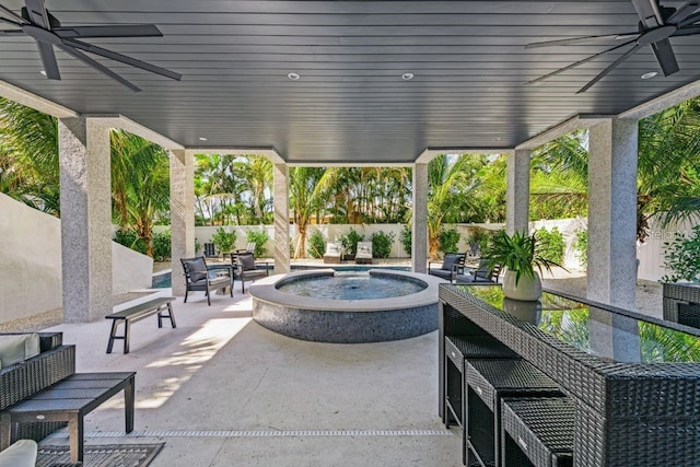 89 Avenida Messina, Sarasota, FL 34242 - view of patio with ceiling fan, a fenced backyard, and an in ground hot tub