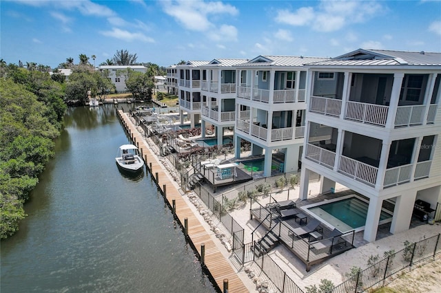 4206 Saltwater Pearl Way, Cortez, FL 34215 - exterior space featuring an outdoor pool, a water view, and fence