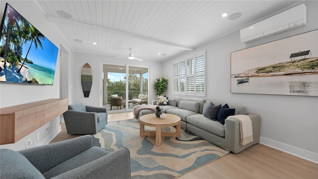 4206 Saltwater Pearl Way, Cortez, FL 34215 - living area with wood finished floors, an AC wall unit, wooden ceiling, a ceiling fan, and beamed ceiling