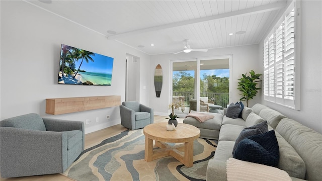 4206 Saltwater Pearl Way, Cortez, FL 34215 - living area with beamed ceiling, plenty of natural light, a ceiling fan, and wood finished floors