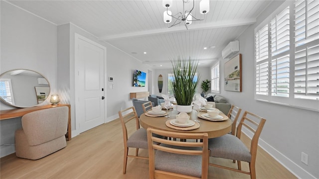 4206 Saltwater Pearl Way, Cortez, FL 34215 - dining space featuring a chandelier, wooden ceiling, an AC wall unit, and light wood-style floors