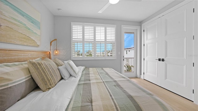 4206 Saltwater Pearl Way, Cortez, FL 34215 - bedroom with a ceiling fan, wood finished floors, and access to outside