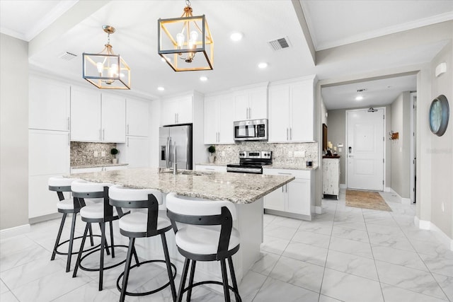 kitchen with recessed lighting, marble finish floor, visible vents, a chandelier, and appliances with stainless steel finishes
