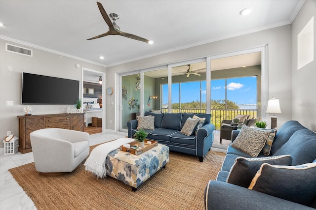 living area with visible vents, baseboards, ceiling fan, ornamental molding, and recessed lighting