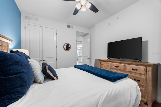 bedroom with a ceiling fan, a closet, and visible vents